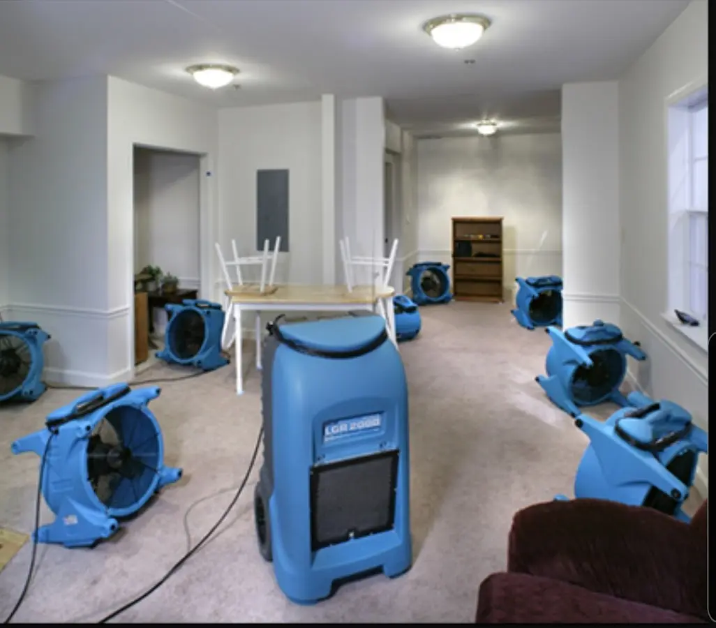 Air movers and dehumidifier setup for Water Extraction & Removal in Bedford
